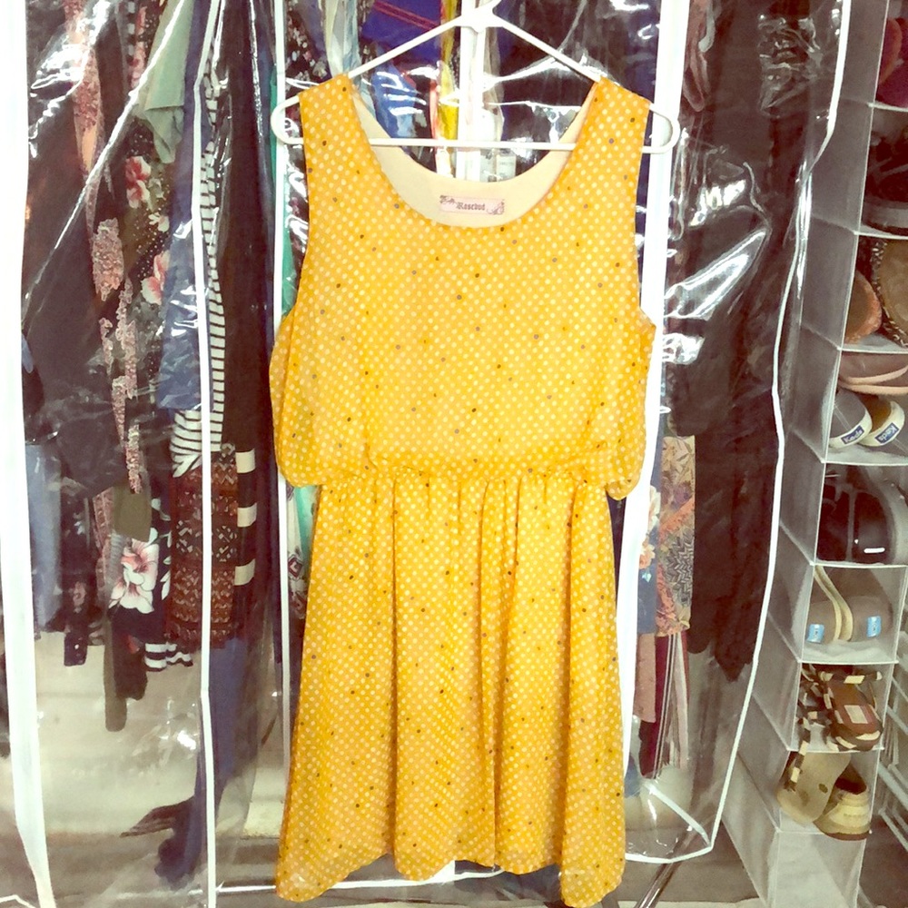 Yellow dress with grey and white dots